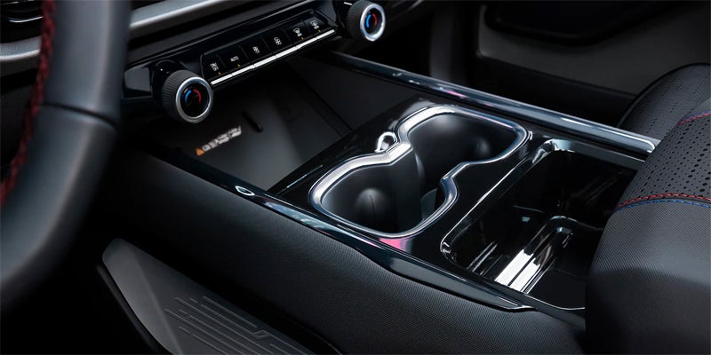 Car console with cup holders.