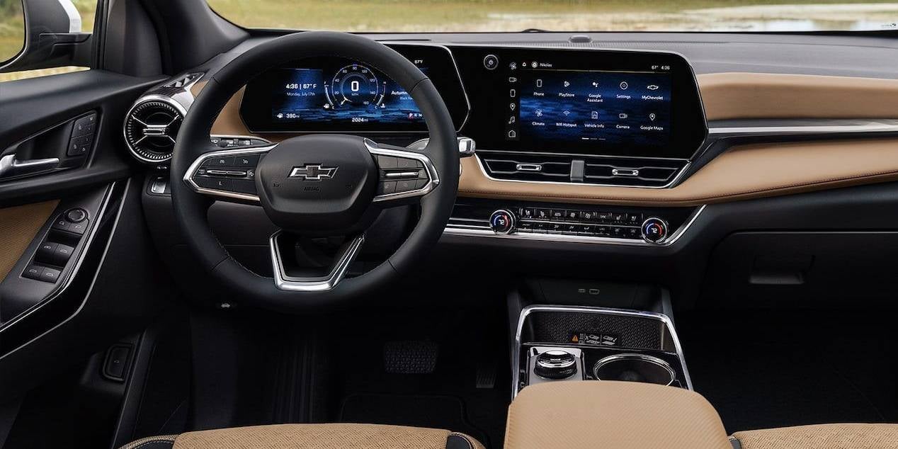 close up of the interior dashboard of a 2025 Chevrolet Equinox in tan leather