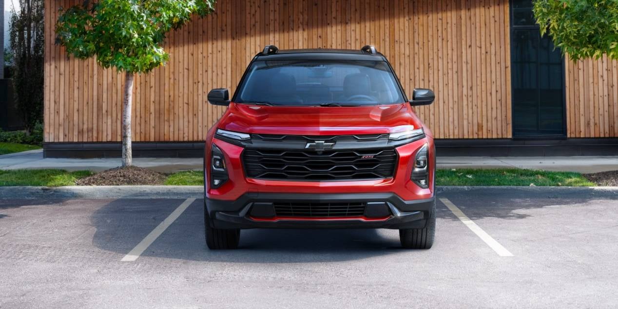 2025 Chevrolet Equinox in red backed into a parking space