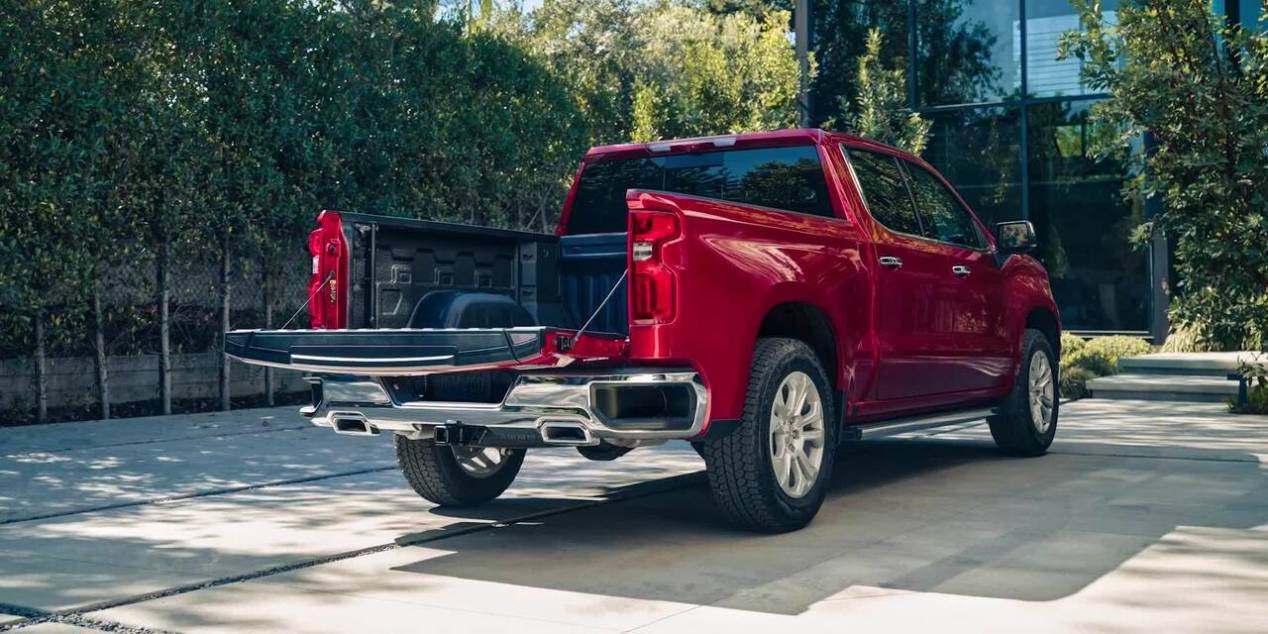 tailgate open of 2025 Chevrolet Silverado while parked in a driveway