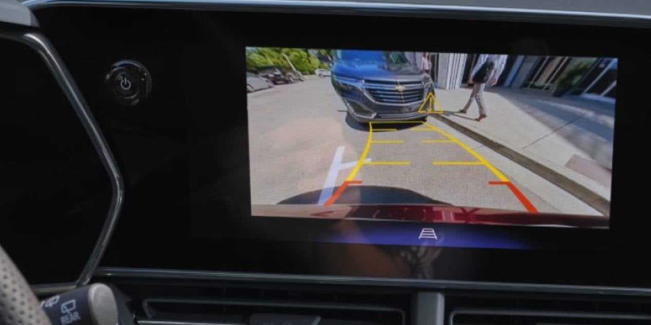 close view of monitor displaying the rear camera view of a 2025 Chevrolet Trax