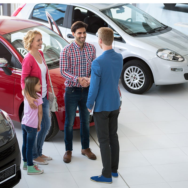 family in the showroom looking for a new car at i.g. Burton Chevrolet of Seaford in Seaford DE