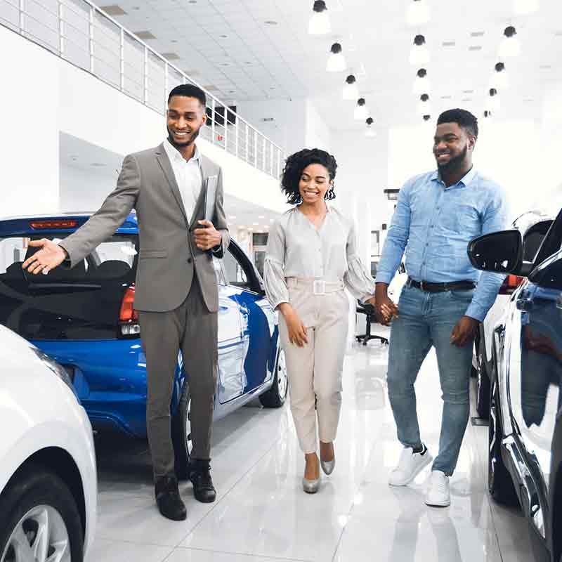 i.g. Burton Chevrolet of Seaford in Seaford DE couple looking for a new car in the showroom